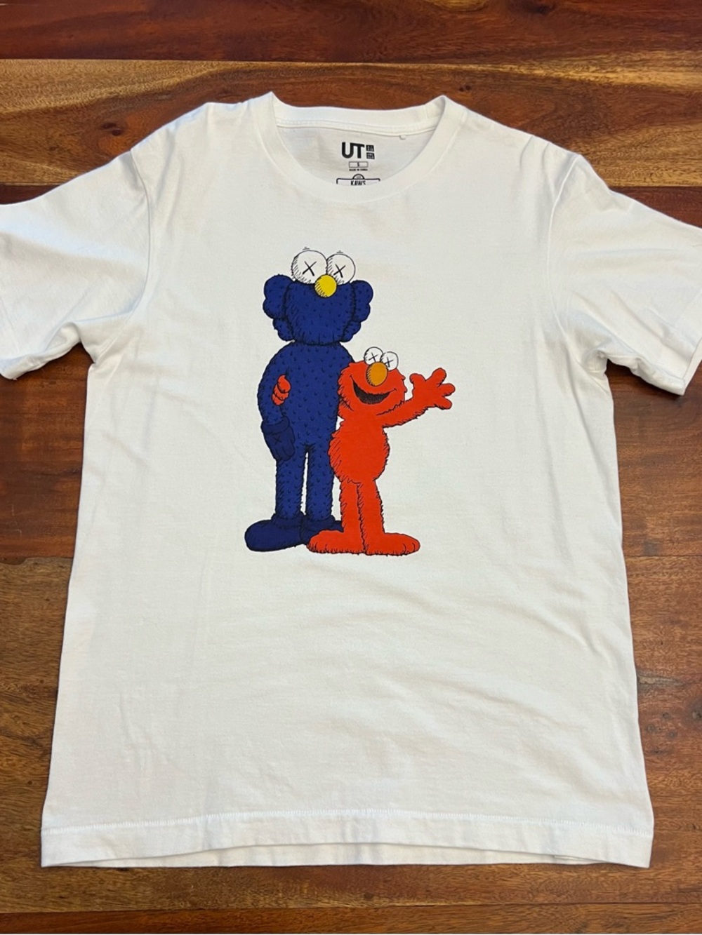 KAWS White Tee with Blue & Orange Character Graphic